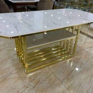 Table à manger doré en marbre