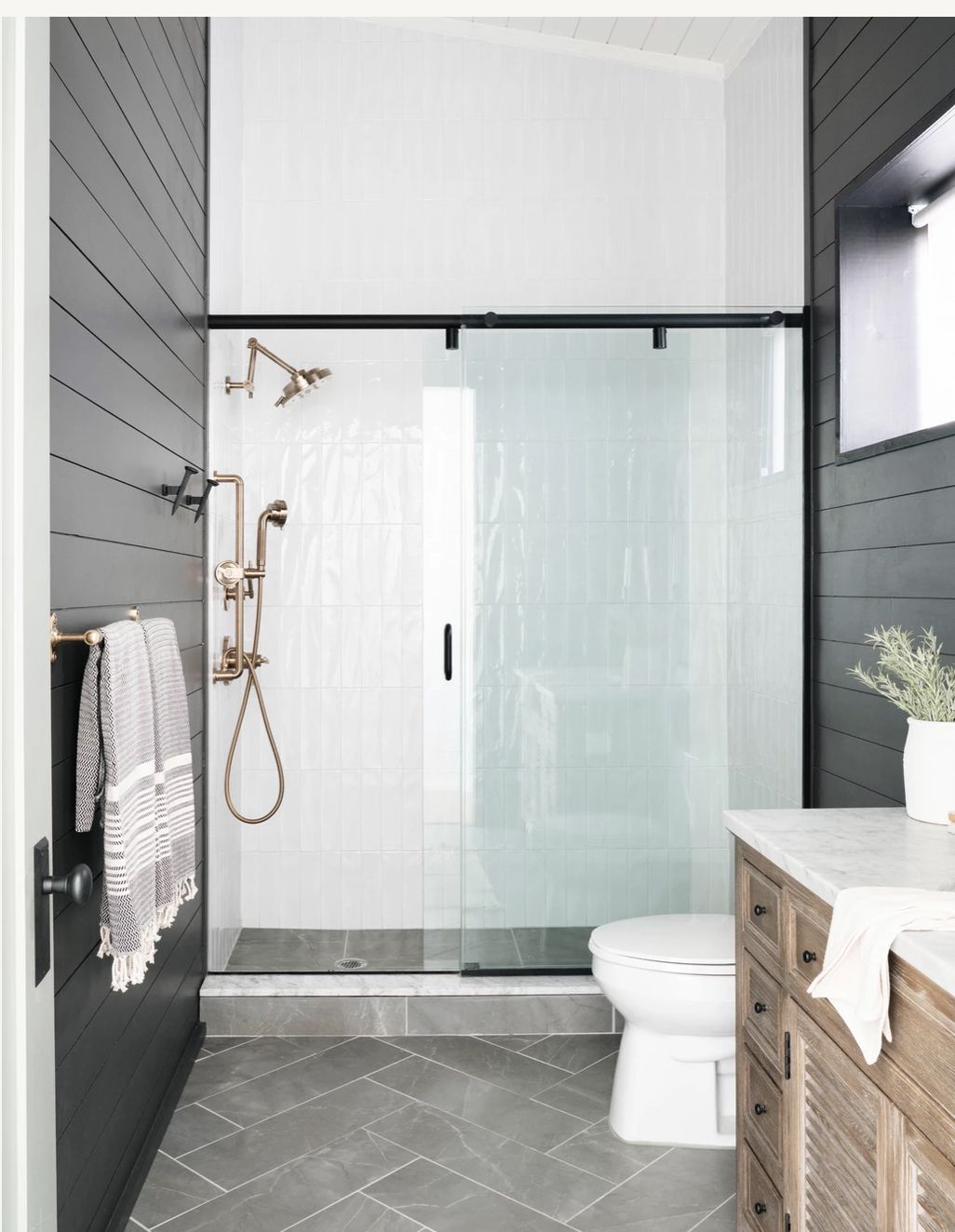 gray and white bathroom with shiplap walls